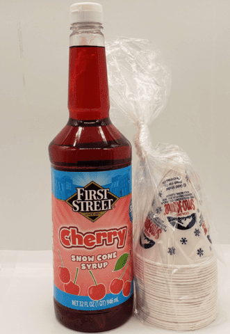 Cherry soda bottle with a stack of disposable cups beside it.