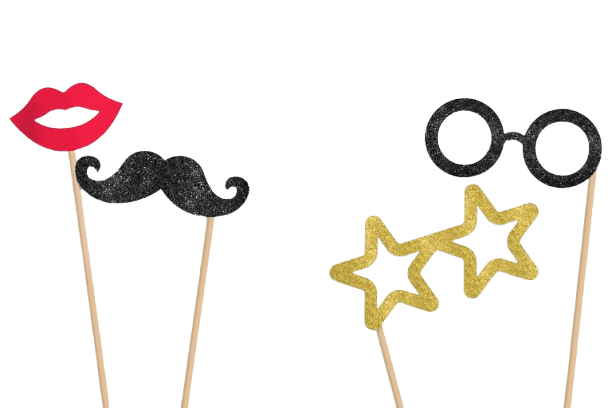 Photo booth props including a mustache, lips, and star-shaped glasses on sticks.
